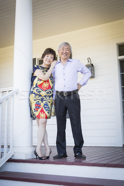 Attractive Chinese Couple Enjoying Their House Stock photo © feverpitch