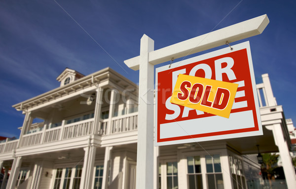 Sold Home For Sale Sign in Front of New House  Stock photo © feverpitch