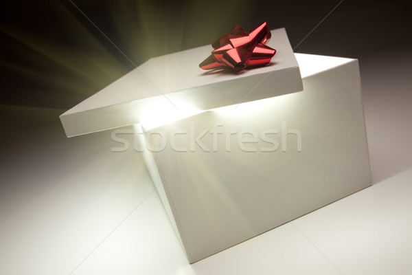 Red Bow Gift Box Lid Showing Very Bright Contents Stock photo © feverpitch