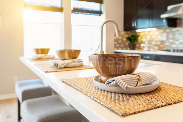 Wooden Bowl Place Settings on Kitchen Island Abstract Stock photo © feverpitch