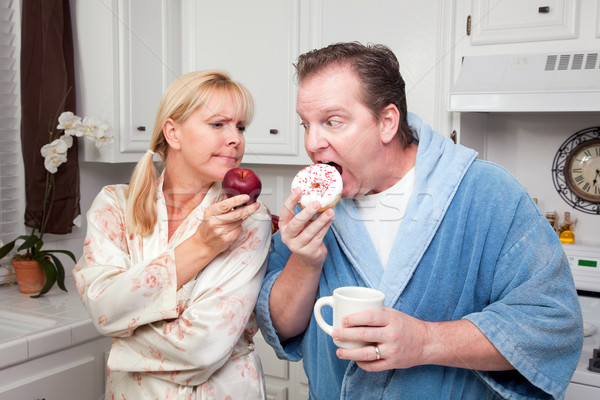 Obst Donut gesunde Ernährung Entscheidung Paar Küche Stock foto © feverpitch