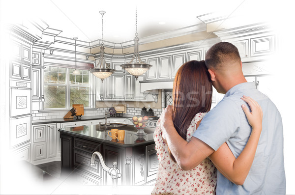 Young Military Couple Inside Custom Kitchen and Design Drawing C Stock photo © feverpitch