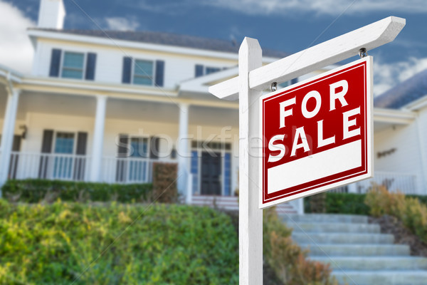 Stock photo: Right Facing For Sale Real Estate Sign In Front of House.