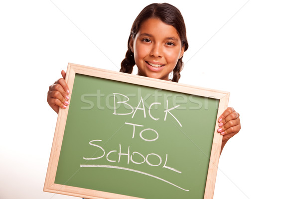 Pretty Hispanic Girl Holding Chalkboard with Back To School Stock photo © feverpitch