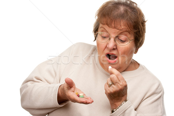 Attractive Senior Woman and Medication Pills Stock photo © feverpitch