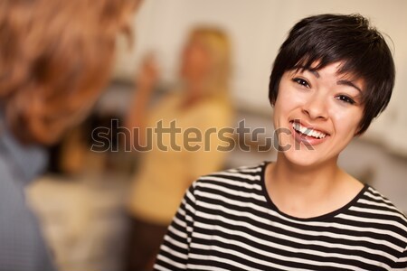 Laughing Young Woman Socializing Stock photo © feverpitch