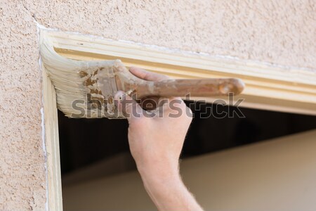 Professional Painter Cutting In With Brush to Paint House Door F Stock photo © feverpitch