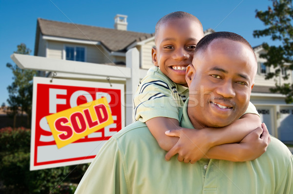 Stock photo: Father and Son In Front of Real Estate Sign and Home