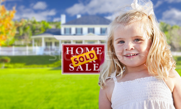 Girl in Yard with Sold Real Estate Sign and House Stock photo © feverpitch