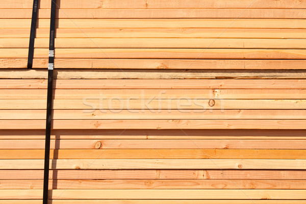 Gebouw timmerhout bouwplaats hout achtergrond Stockfoto © feverpitch