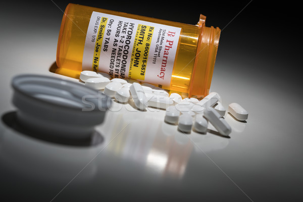 Hydrocodone Pills and Prescription Bottle with Non Proprietary L Stock photo © feverpitch