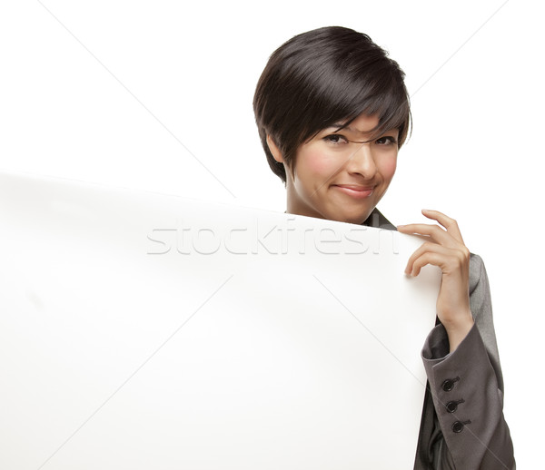 Mixed Race Young Adult Female Holding Blank White Sign Stock photo © feverpitch