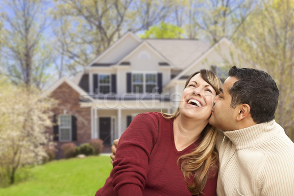 Happy Mixed Race Couple in Front of House Stock photo © feverpitch