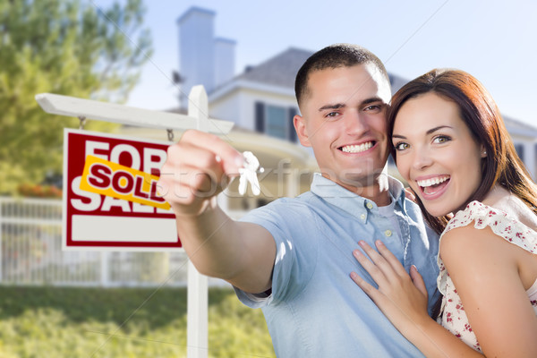Military Couple In Front of Home, House Keys and Sign Stock photo © feverpitch