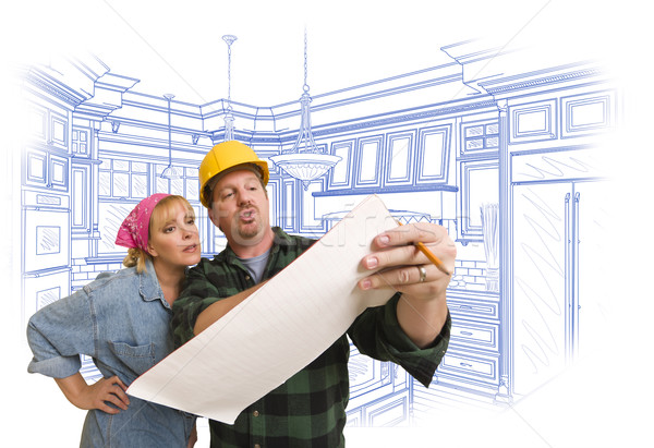 Contractor Discussing Plans with Woman, Kitchen Drawing Behind Stock photo © feverpitch