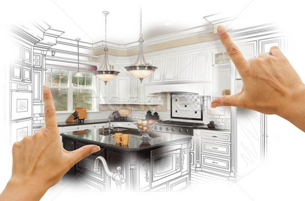 Stock photo: Hands Framing Custom Kitchen Design Drawing and Photo Combinatio