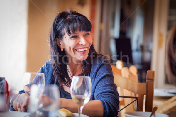 Pretty Italian Woman Enjoys A Meal And Drinks with Friends at Ou Stock photo © feverpitch