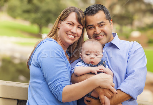 Boldog félvér család pózol portré kívül Stock fotó © feverpitch