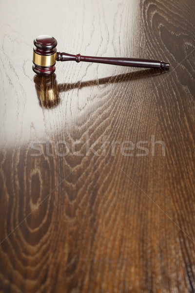 Wooden Gavel Abstract on Reflective Table Stock photo © feverpitch