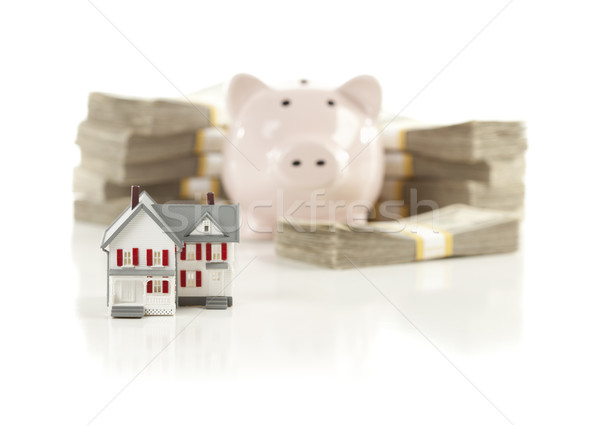 Small House and Piggy Bank with Stacks Money Stock photo © feverpitch