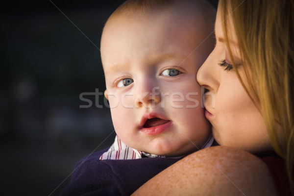 Adorable Red Head Infant Boy is Kissed By His Mother Stock photo © feverpitch