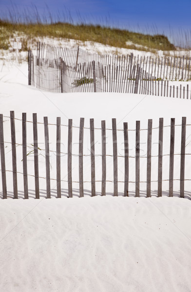 Homok kerítés tengerpart fehér homok felhők természet Stock fotó © feverpitch