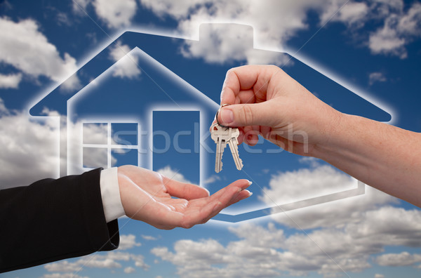 Handing Over Keys on Ghosted Home Icon, Clouds and Sky Stock photo © feverpitch
