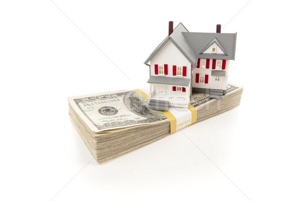 Small House on Stack of Hundred Dollar Bills Stock photo © feverpitch