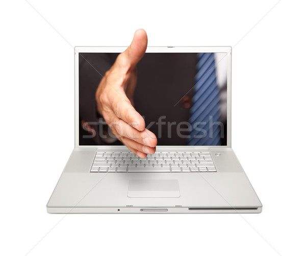Adam el sıkışma dizüstü bilgisayar ekran yalıtılmış beyaz Stok fotoğraf © feverpitch