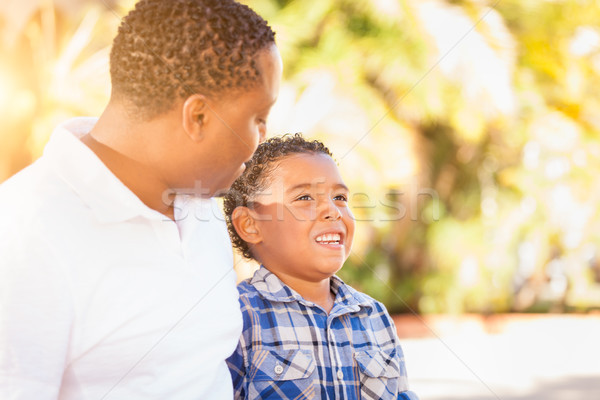 Mixed Race Son and African American Father Playing Outdoors Toge Stock photo © feverpitch