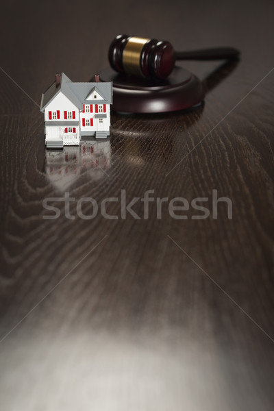 Gavel and Small Model House on Table Stock photo © feverpitch