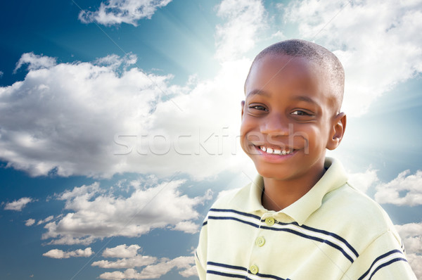 [[stock_photo]]: Jeunes · garçon · nuages · ciel · heureux