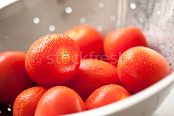 Fraîches dynamique roma tomates gouttes d'eau macro Photo stock © feverpitch