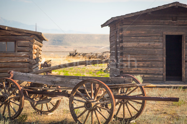 Abstract Of Vintage Antique Wood Wagon And Log Cabins Stock Photo