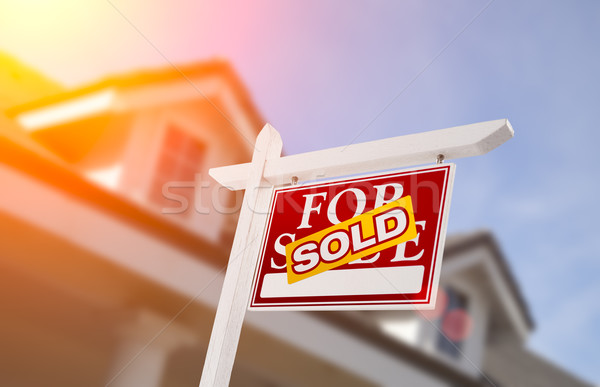 Sold Home For Sale Sign in Front of New House Stock photo © feverpitch