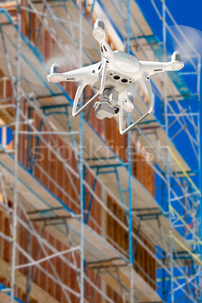 Drone Quadcopter Flying and Inspecting Construction Site Stock photo © feverpitch