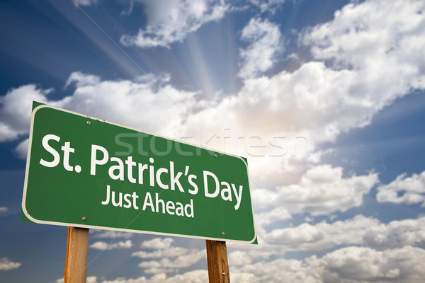 Stock photo: St. Patricks Day Just Ahead Green Road Sign and Clouds