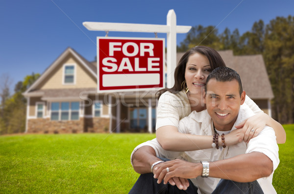 Hispanic Couple, New Home and For Sale Real Estate Sign Stock photo © feverpitch