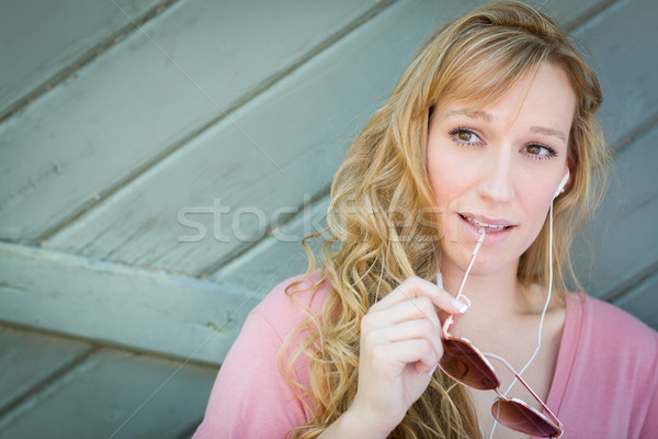 Outdoor Portrait of Young Adult Brown Eyed Woman With Sunglasses Stock photo © feverpitch