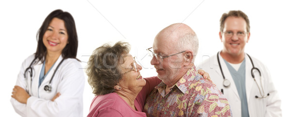 Foto stock: Pareja · de · ancianos · médicos · médicos · detrás · feliz