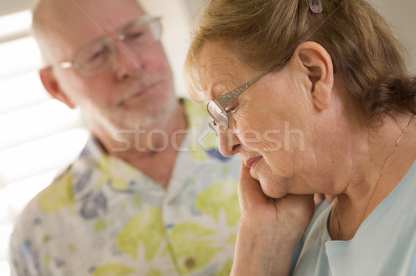 Senior Adult Male Consoles Sad Senior Adult Female Stock photo © feverpitch