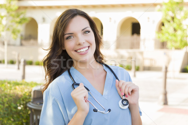 Orgulloso mujer médico enfermera retrato Foto stock © feverpitch