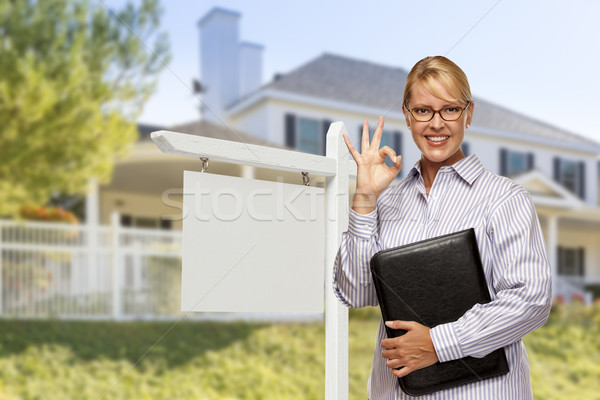Stock photo: Real Estate Agent in Front of Blank Sign and House