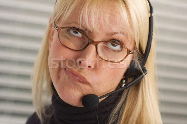 Attractive Businesswoman with Phone Headset Stock photo © feverpitch