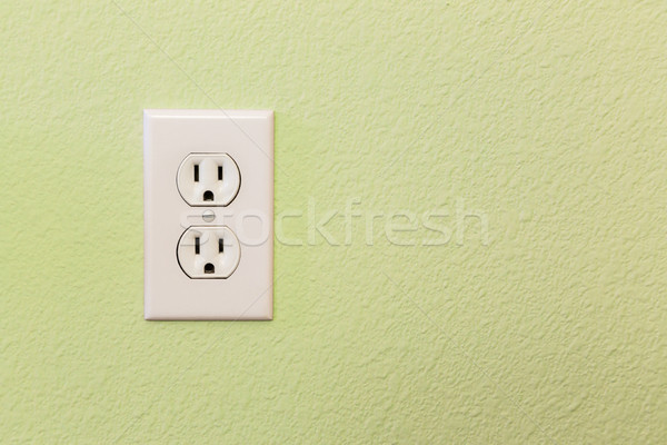 Electrical Sockets In Colorful Wall Stock photo © feverpitch