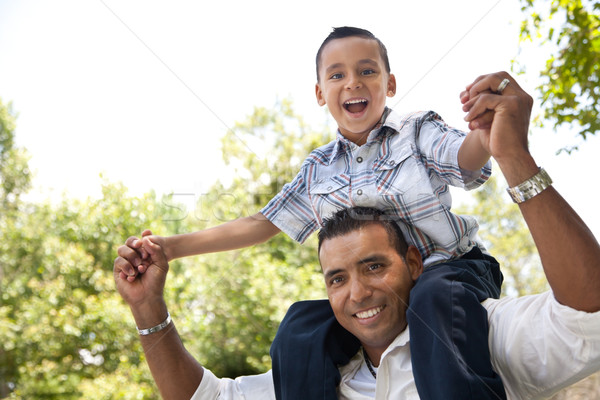 Hispanic Father and Son Having Fun in the Park Stock photo © feverpitch