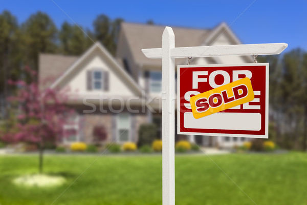 Sold Home For Sale Sign in Front of New House Stock photo © feverpitch