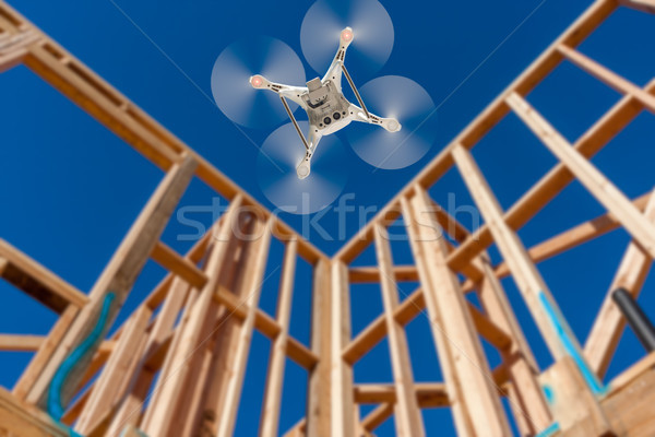 Drone Quadcopter Flying and Inspecting Construction Site Stock photo © feverpitch