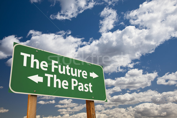 The Future, The Past Green Road Sign Over Clouds Stock photo © feverpitch