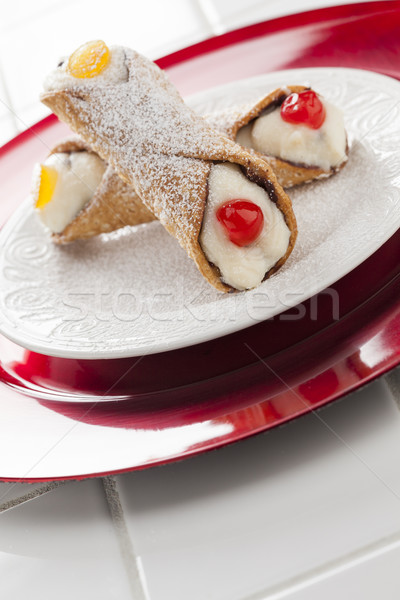 Two Tasty Cannoli on Plate Stock photo © feverpitch